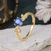 Nature Inspired Round Six Claw Sapphire Leaf Engagement Ring